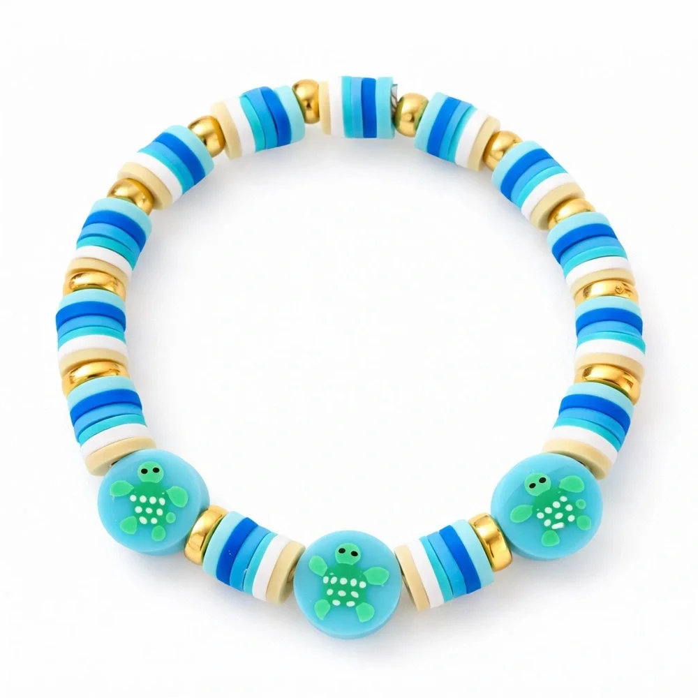 Blue and‎ Gold Beaded Bracelet with Decorative Accents